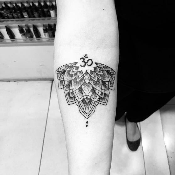om mandala lotus tattoo design dotwork female forearm
