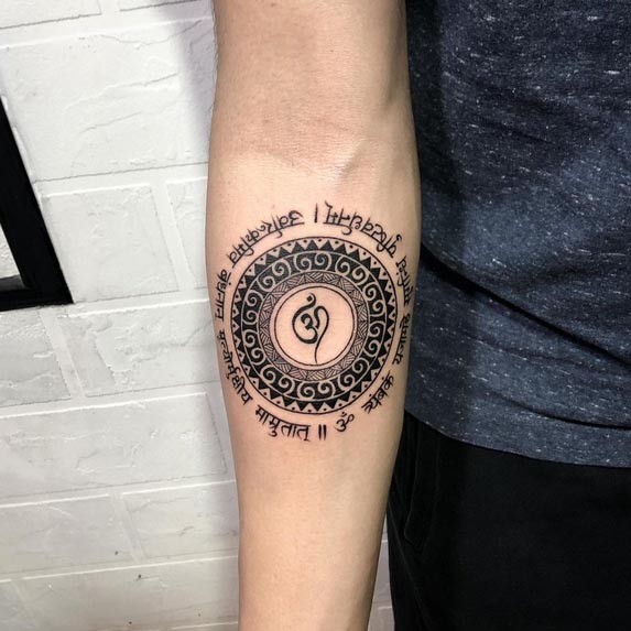 om in center mandala maha mrityunjaya mantra tattoo forearm