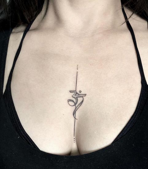 sanskrit om symbol on single line with 3 dots at both ends design female sternum