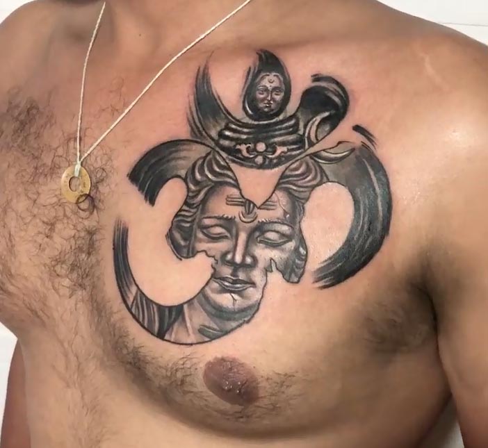 shiva kali faces merged with om tattoo design black and grey male chest