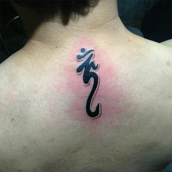 small om tattoo design male back