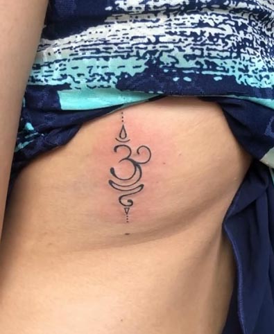small om unalome 3 dots at both ends tattoo design female side