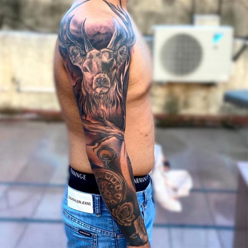 full sleeve animal tattoo owl wolf stag rose 2