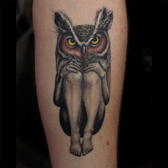 owl face human sitting tattoo male forearm
