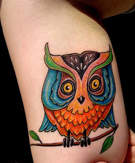 owl sitting on branch color tattoo old school custom inner bicep