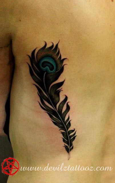 peacock feather back tattoo art