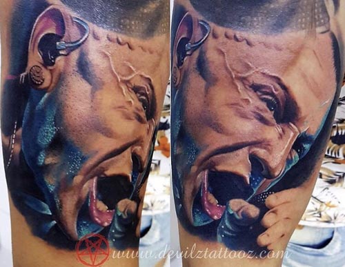 chester bennington portrait tattoo on Leg