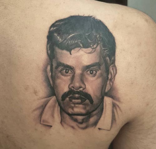 portrait tattoo on back