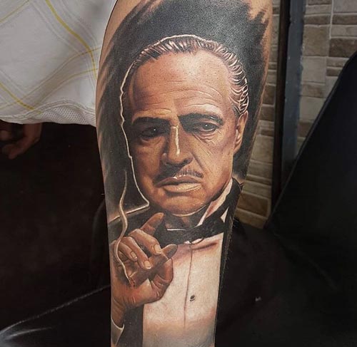 godfather portrait tattoo design on Forearm