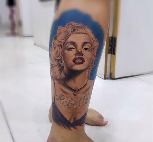 marilyn monroe portrait tattoo on foot