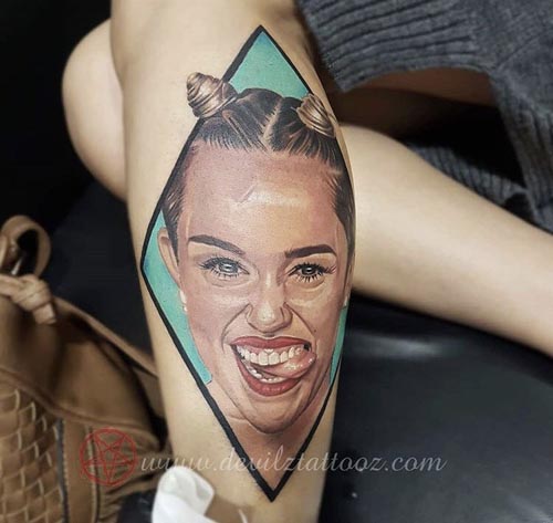 miley cyrus portrait tattoo on Arm