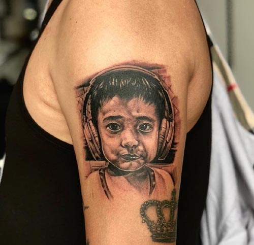nephew tattoo on arm