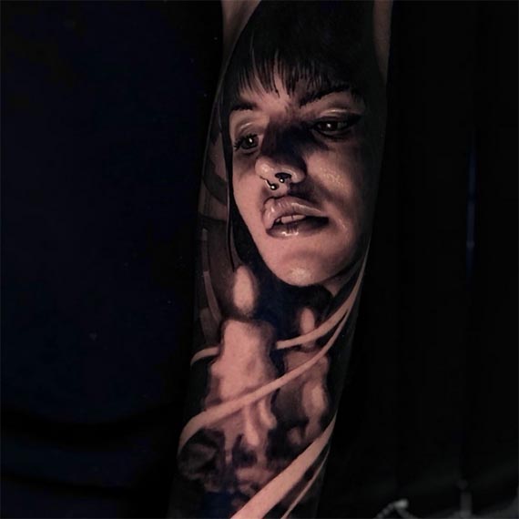 a girl and a candle portrait tattoo realism male forearm
