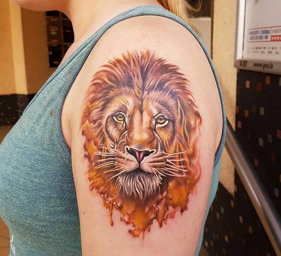 lion head watercolor tattoo design female arm bicep