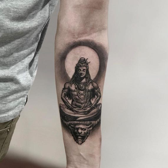 meditating shiva tattoo design male forearm