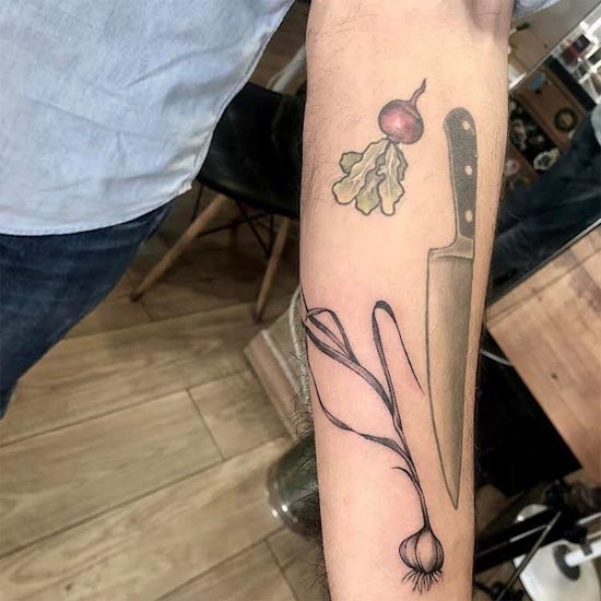 spring onion tattoo design male hand forearm