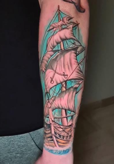 wooden ship tattoo design color male forearm