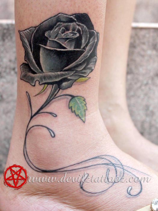 black rose tattoo on ankle