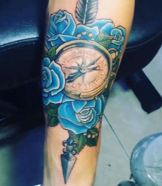 compass blue rose arrow tattoo new school male forearm