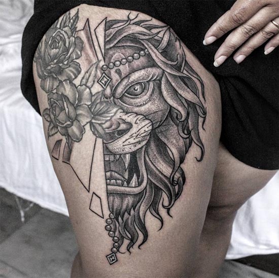 half lioness face half rose flower tattoo design female thigh