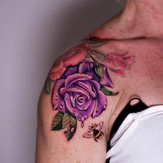 purple rose green leaves bee tattoo design female shoulder