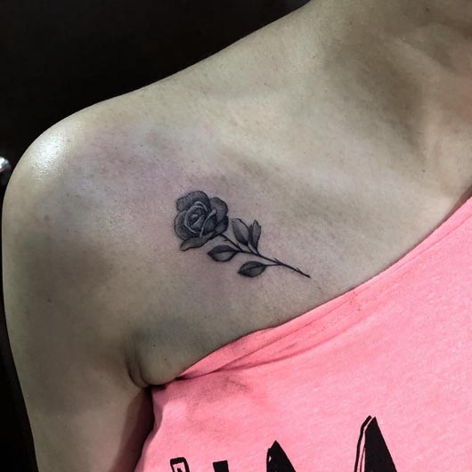 rose black and grey tattoo design female collarbone