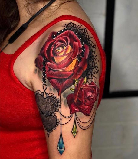 rose heart ornamental tattoo design female hand bicep