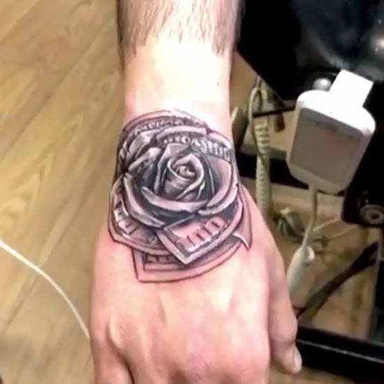 rose money tattoo design male hand black and grey