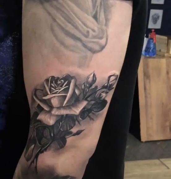 rose petal tattoo design realistic male arm