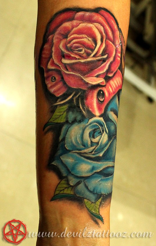 rose tattoo on forearm