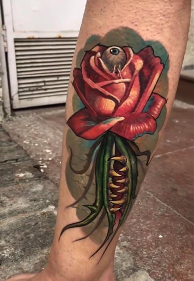 rose with evil eye goth tattoo design color female leg calf