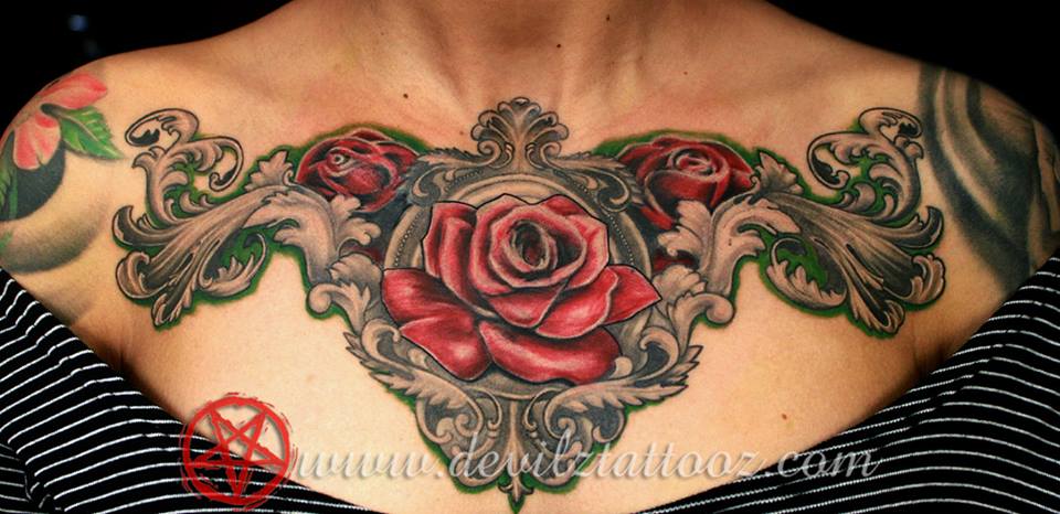 roses chest piece tattoo