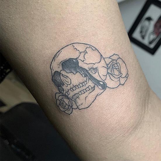 skull with tears 2 roses tattoo design male hand bicep