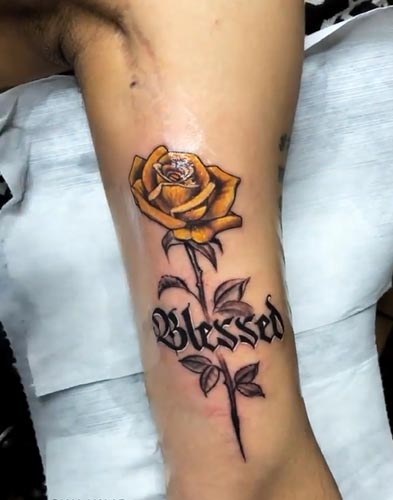yellow rose word blessed tattoo design male bicep