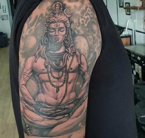 meditating shiva tattoo on Bicep