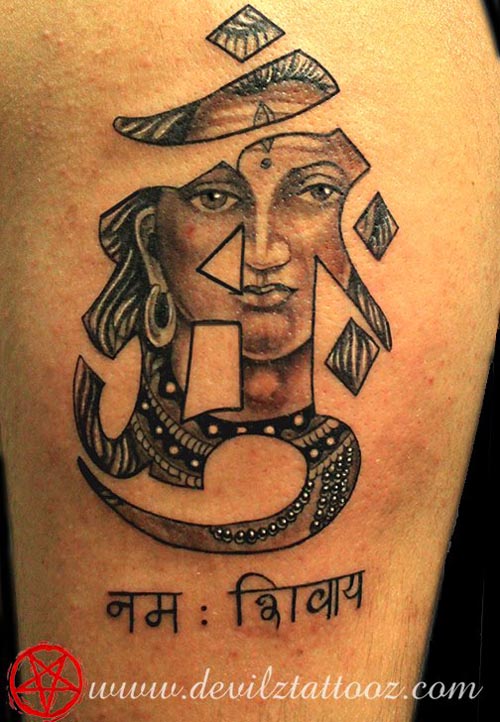 shiva om balck and grey tattoo on Bicep