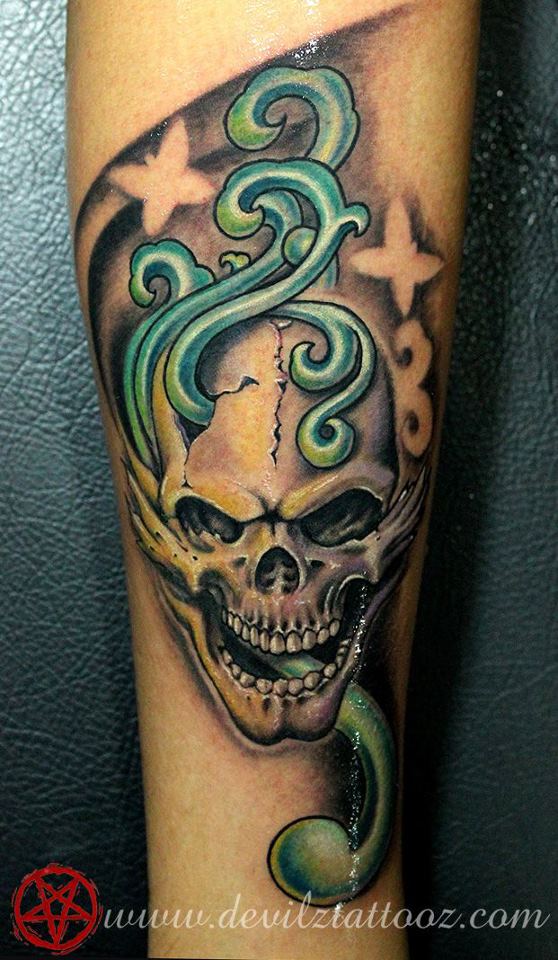 Ivy skull calf color tattoo