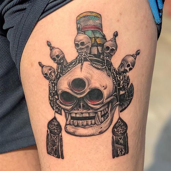 citipati buddhism skulls tattoo male leg thigh