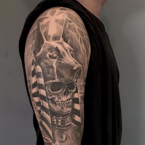 dog headdress skull tattoo design male bicep