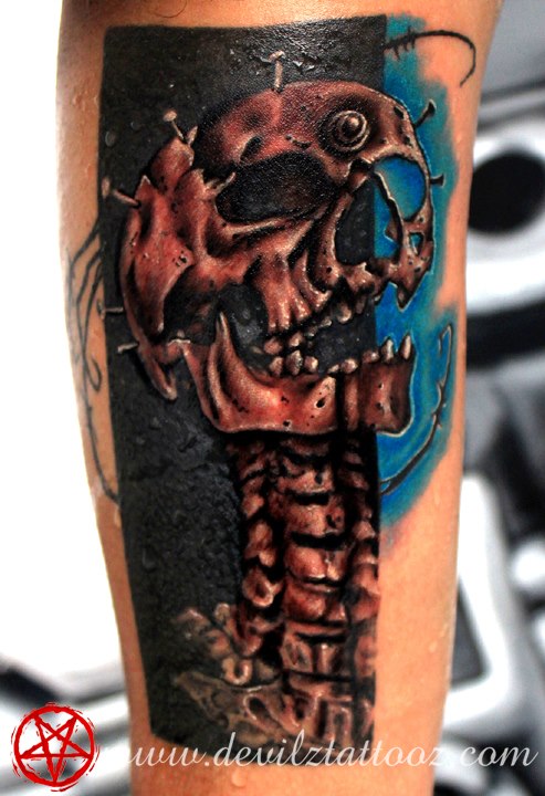 skull color inner arm tattoo