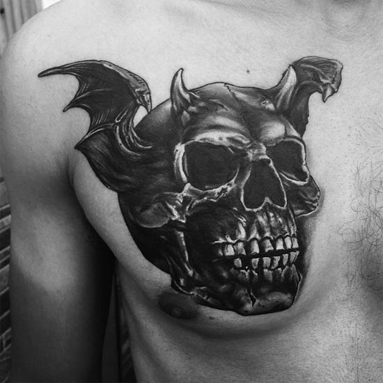 skull with wings tattoo black and grey boy chest