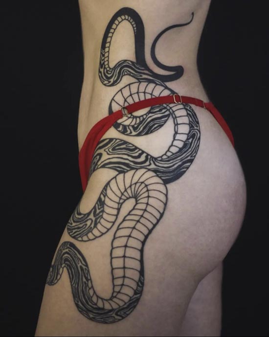 intertwined snake going down female side hip thigh
