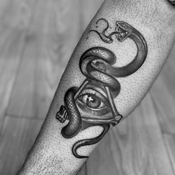 snake illuminati eye tattoo design male hand forearm