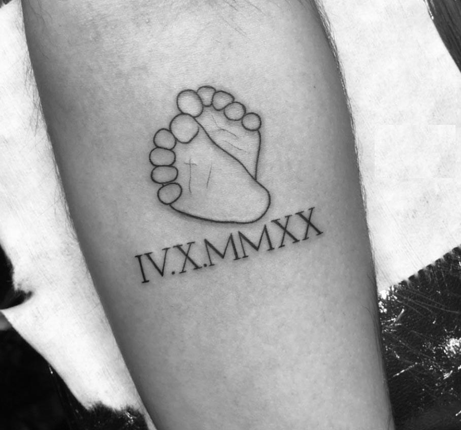 sons footprint tattoo