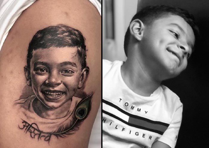 upper am male son portrait tattoo