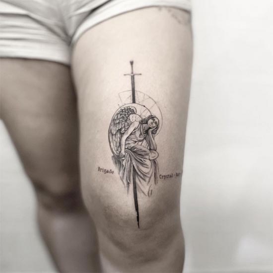 angel sword geometric pattern tattoo fine line female leg thigh
