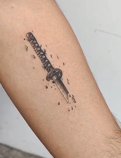broken katana sword tattoo design male forearm