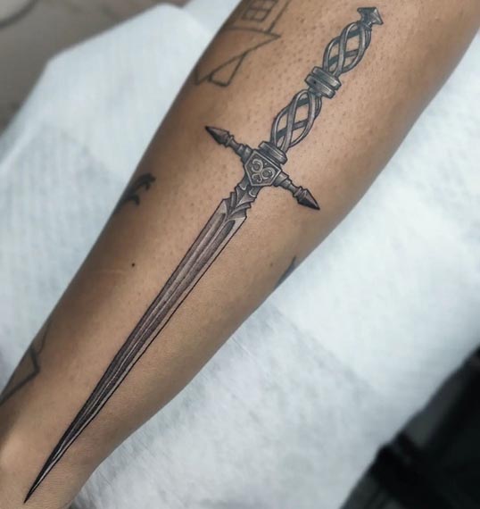 sword realistic tattoo design female forearm