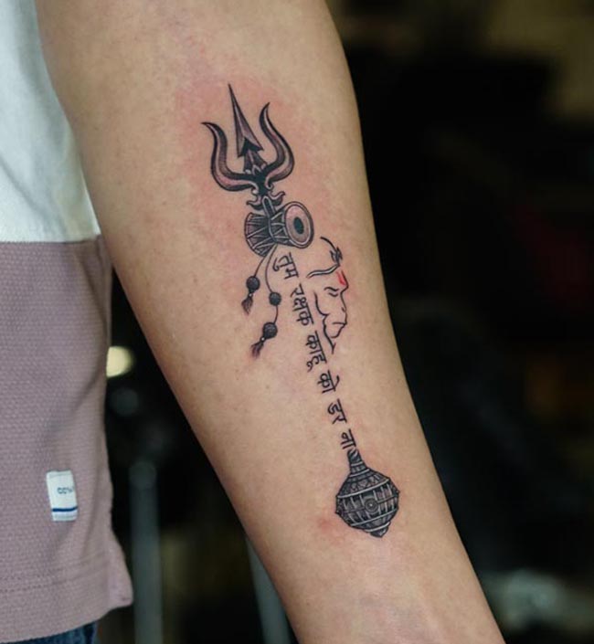 hanuman side face with trishul damru rudraksha beads hindi quote gada tattoo man forearm