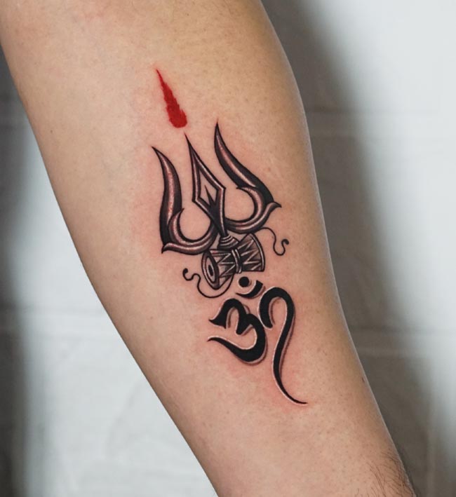 trishul damru om and tilak at top tattoo male forearm